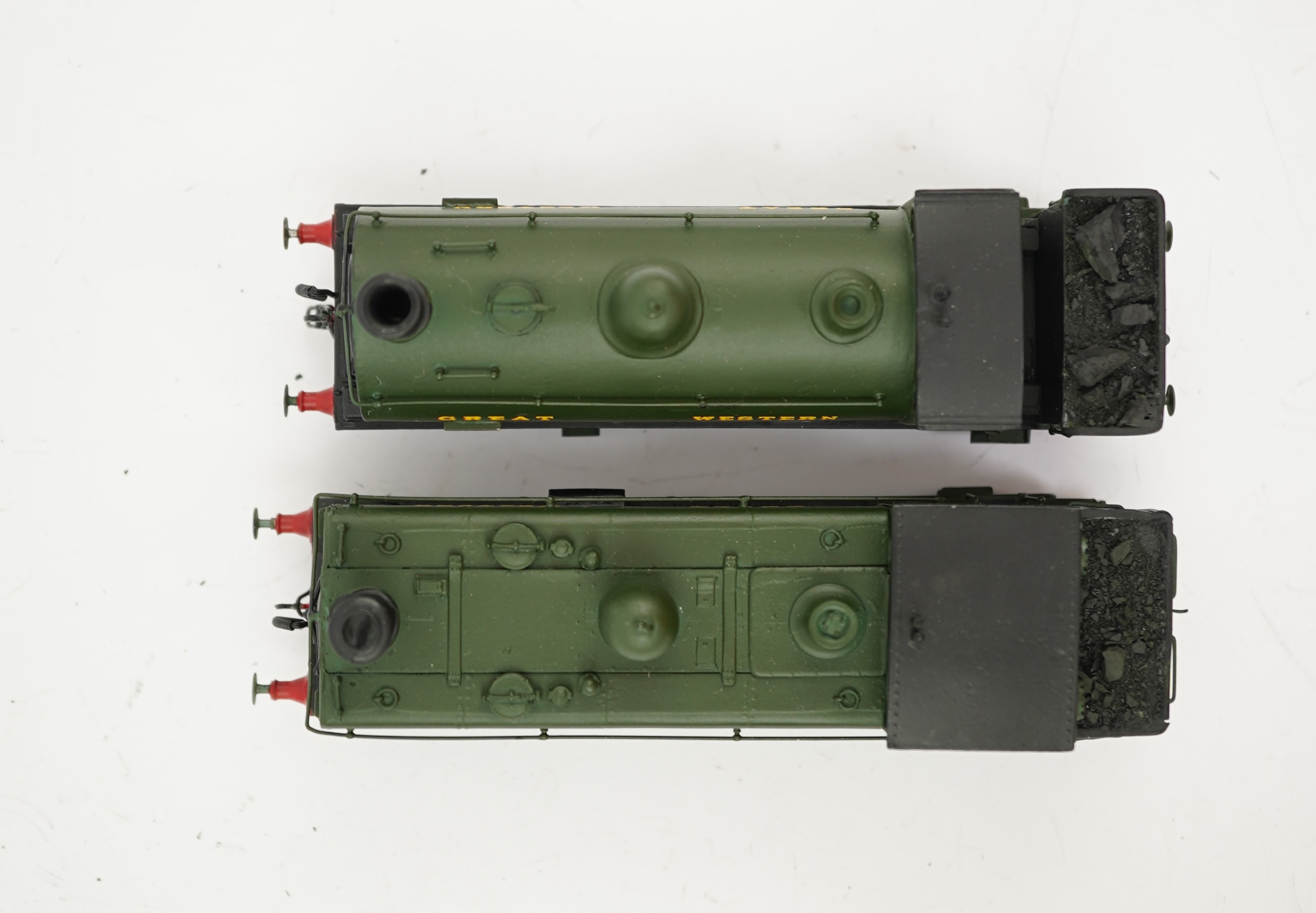 Two 00 gauge brass and white metal kit built GWR tank locomotives; a 2021 class 0-6-0PT, 2032, together with an 1854 class 0-6-0ST, 1858, constructed, painted and lined to a high standard, both motored for two rail opera